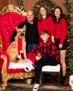 Holiday family photo with dog